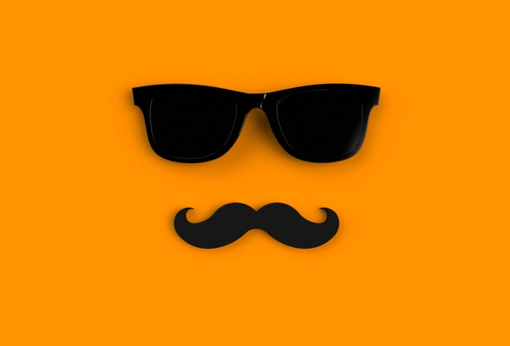 Father's day concept. Hipster black sunglasses and funny moustac